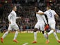 England's striker Danny Welbeck (C) celebrates after scoring his team's second goal during the Euro 2016 Qualifier, Group E football match against Slovenia on November 15, 2014