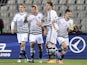 Denmark's defender Simon Kjaer celebrates with his teammates after scoring a goal during the Euro 2016 group I qualifying football match between Serbia and Denmark in Belgrade on November 14, 2014