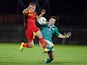 Belgium's Jinty Canepeel and Northern Ireland's Jamie Harney vie for the ball during the Euro 2014 U19 qualifying football match between Belgium and Northern Ireland on October 10, 2013