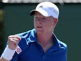 Kyle Edmund of Great Britain celebrates a point against Julien Benneteau of France during their first round match on March 19, 2014