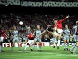 Teddy Sheringham of Manchester United heads goalwards during the UEFA Champions League Final against Bayern Munich at the Nou Camp in Barcelona on 26 May, 1999
