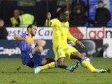 Shrewsbury's English defender Mickey Demetriou vies with Chelsea's Ivorian striker Didier Drogba during the English League Cup round four football match between Shrewsbury Town and Chelsea at the Greenhous Meadow stadium in Shrewsbury, West Midlands, Engl