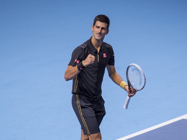 Novak Djokovic of Serbia celebrates after beating Marin Cilic of Croatia 2-0 in their round robin match during the Barclays ATP World Tour Finals at the O2 Arena on November 10, 2014
