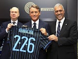 Marco Fassone, new coach of FC Internazionale Milano Roberto Mancini and Michael Bolingbroke during a press conference on November 15, 2014