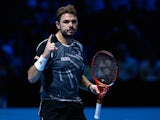 Stan Wawrinka of Switzerland celerates defeating Tomas Berdych of Czech Republic in the round robin during day two of the Barclays ATP World Tour Finals tennis at the O2 Arena on November 10, 2014 