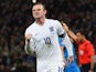 Wayne Rooney of England celebrates as he scores their first and equalising goal from a penalty during the EURO 2016 Qualifier Group E match between England and Slovenia on November 15, 2014