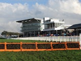 A general view of the grandstand at Wetherby Racecourse and the last hurdle fence before the finish ahead of The bet365 Charlie Hall Meeting on November, 2014