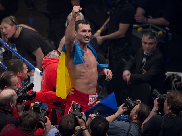 Ukrainian World heavyweight boxing champion Wladimir Klitschko celebrates victory over Australia's Alex Leapai after the WBA, IBF, WBO and IBO title bout in Oberhausen, north-western Germany, on April 26, 2014