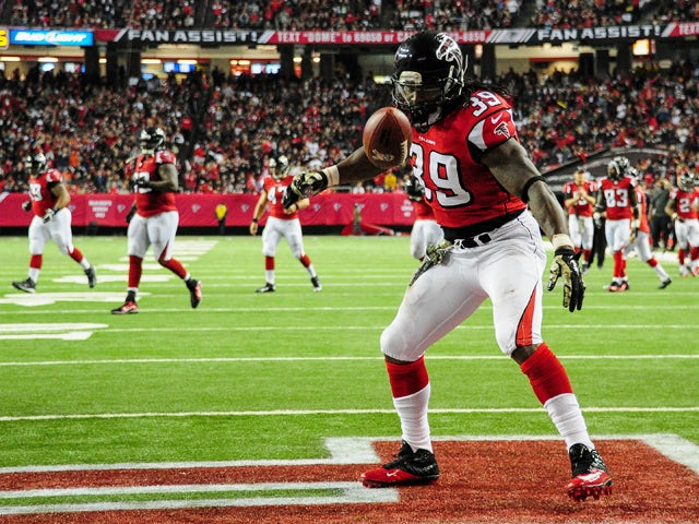 Steven Jackson #39 of the Atlanta Falcons celebrates a touchdown in the second half against the Cleveland Browns at Georgia Dome on November 23, 2014