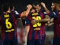 Lionel Messi of FC Barcelona celebrates with his teammates after scoring the opening goal during the La Liga mach between FC Barcelona and Sevilla FC at Camp Nou on November 22, 2014