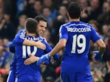 Cesc Fabregas of Chelsea hugs Eden Hazard of Chelsea after he scored their second goal during the Barclays Premier League match between Chelsea and West Bromwich Albion at Stamford Bridge on November 22, 2014