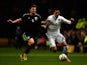 Chris Martin of Scotland and Chris Smalling of England compete for the ball during the International Friendly match on November 19, 2014