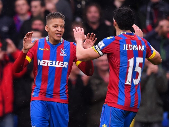 Dwight Gayle of Crystal Palace celebrates his goal with Mile Jedinak of Crystal Palace during the Barclays Premier League match between Crystal Palace and Liverpool at Selhurst Park on November 23, 2014