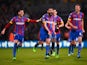 Mile Jedinak of Crystal Palace celebrates scoring his team's third goal with team mates during the Barclays Premier League match between Crystal Palace and Liverpool at Selhurst Park on November 23, 2014