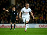 Craig Bryson of Derby County celebrates scoring his sides second goal during the Sky Bet Championship match between Watford and Derby County at Vicarage Road on November 22, 2014