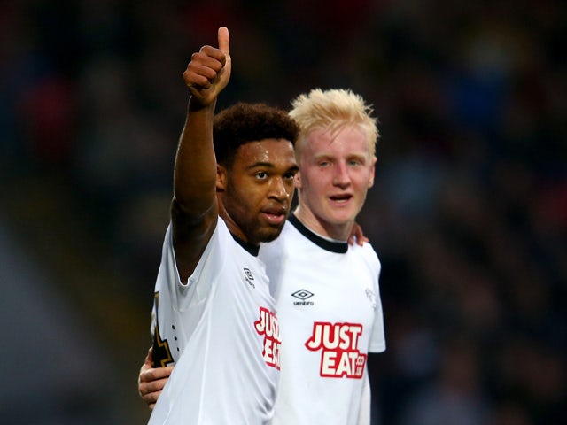 Jordan Ibe of Derby County celebrates with Will Hughes after scoring the opening goal during the Sky Bet Championship match between Watford and Derby County at Vicarage Road on November 22, 2014