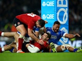 Jonny May of England celebrates with team-mate Brad Barritt of England after scoring a try during the QBE international match between England and Samoa at Twickenham Stadium on November 22, 2014