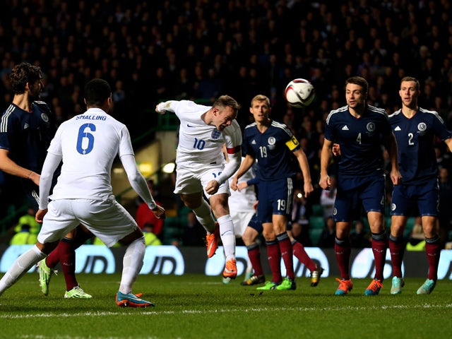 Wayne Rooney of England scores his team's second goal during the International Friendly match between Scotland and England at Celtic Park Stadium on November 18, 2014