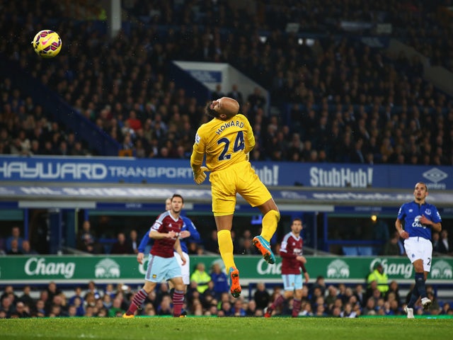 Tim Howard of Everton watches the ball loop over his head after a shot by Mauro Zarate of West Ham United for the equalising goal during the Barclays Premier League match between Everton and West Ham United at Goodison Park on November 22, 2014