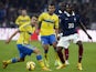 Sweden's midfielder Albin Ekdal vies with French forward Guilavogui during the friendly football match France vs Sweden on November 18, 2014
