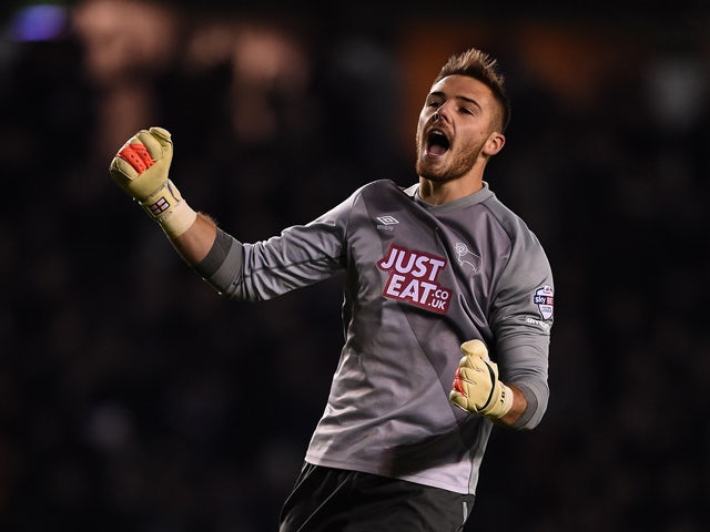 Jack Butland of Derby County celebrates the third goal during the Sky Bet Championship match between Derby County and Huddersfield Town at iPro Stadium on November 4, 2014