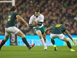 Jared Payne of Ireland is tackled by Bismarck Du Plessis and Francois Houggard of South Africa during the 2014 Guinness series International match between Ireland and South Africa at Aviva Stadium on November 8, 2014