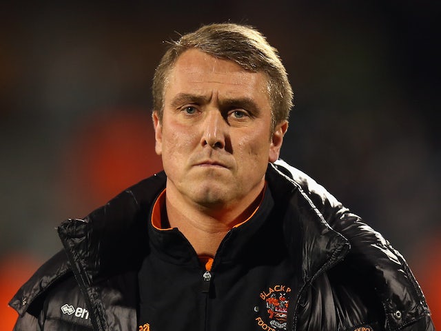 Blackpool Manager Lee Clark looks on prior to the Sky Bet Championship match between Fulham and Blackpool at Craven Cottage on November 5, 2014