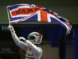 Hamilton claims victory at season-opening Grand Prix