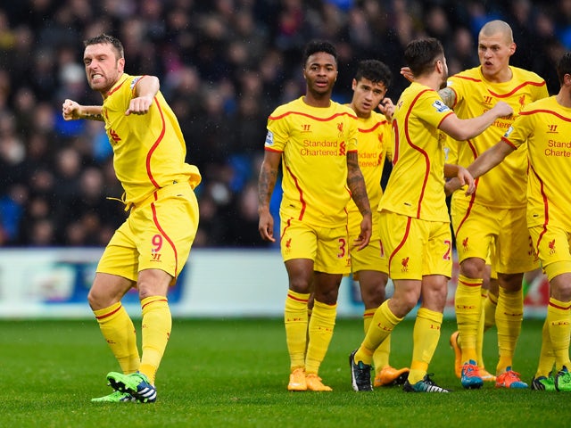 Rickie Lambert of Liverpool celebrates scoring the opening goal during the Barclays Premier League match between Crystal Palace and Liverpool at Selhurst Park on November 23, 2014