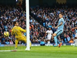 Stevan Jovetic of Manchester City scores his goal during the Barclays Premier League match between Manchester City and Swansea City at Etihad Stadium on November 22, 2014