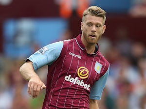 Villa defender Nathan Baker joins Robins