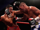 Nathan Cleverly (L) of Wales and Tony Bellew of England exchange punches during the WBO Light-Heavyweight Championship of the World bout on October 15, 2011