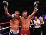 Nathan Cleverly of Wales and Tony Bellew (L) of England embrace after The WBO Light-Heavyweight Championship of the World held at Liverpool Echo Arena on October 15, 2014
