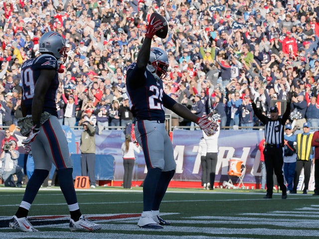 LeGarrette Blount #29 of the New England Patriots reacts after scoring a touchdown during the second quarter against the Detroit Lions at Gillette Stadium on November 23, 2014 