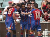 Marcos Flores of the Jets celebrates after scoring his teams first goal during the round seven A-League match between the Western Sydney Wanderers and the Newcastle Jets at Pirtek Stadium on November 22, 2014