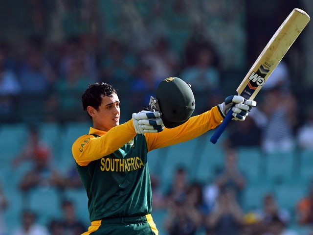 South Africa's batsman Quinton de Kock celebrates his 100 runs against Australia during their fifth one-day international cricket match in Sydney on November 23, 2014