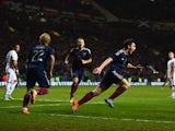 Andrew Robertson of Scotland celebrates scoring their first goal during the International Friendly between Scotland and England at Celtic Park Stadium on November 18, 2014