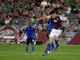 Shane O'Neill #27 of Colorado Rapids battles for control of the ball with Matias Perez Garcia #11 of San Jose Earthquakes at Dick's Sporting Goods Park on September 27, 2014
