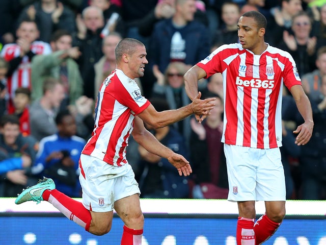 Jonathan Walters of Stoke City celebrates scoring his team's first goal during the Barclays Premier League match between Stoke City and Burnley at the Britannia Stadium on November 22, 2014