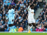 Wilfried Bony of Swansea City celebrates his opening goal during the Barclays Premier League match between Manchester City and Swansea City at Etihad Stadium on November 22, 2014 