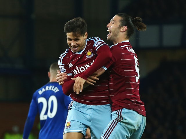 Mauro Zarate of West Ham United celebrates his goal with Andy Carroll during the Barclays Premier League match between Everton and West Ham United at Goodison Park on November 22, 2014