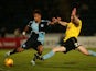 Paris Cowan-Hall of Wycombe is tackled by Darragh Lenihan of Burton during the Sky Bet League Two match between Wycombe Wanderers and Burton Albion at Adams Park on November 17, 2014