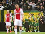 ADO Den Haag player Michiel Kramer celebrates his 1-1 with his teammates during the Dutch Eredivisie football match between ADO Den Haag and Ajax Amsterdam in The Hague on November 30, 2014