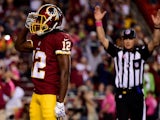 Wide receiver Andre Roberts #12 of the Washington Redskins celebrates after scoring a 4th quarter touchdown against the Seattle Seahawks at FedExField on October 6, 2014