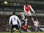 Arsenal's English striker Danny Welbeck jumps to head the opening goal of the English Premier League football match between West Bromwich Albion and Arsenal at The Hawthorns in West Bromwich Albion and Arsenal at The Hawthorns on November 29, 2014