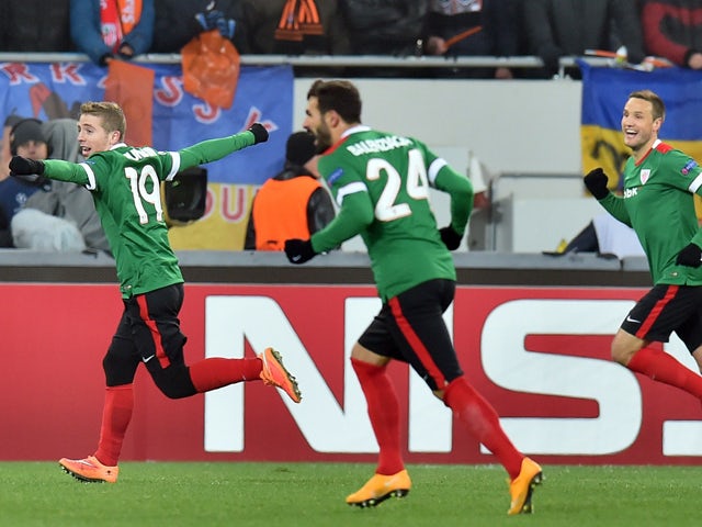 Athletic Bilbao's Iker Mniain and other players celebrate after scoring during the UEFA Champions League Group H football match FC Shakhtar vs Athletic Bilbao in Lviv on November 25, 2014