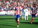 Saul Diges of Club Atletico de Madrid celebrates after scoring his team's opening goal during the UEFA Champions League Group A match between Club Atletico de Madrid and Olympiacos FC at Vicente Calderon Stadium on November 26, 2014