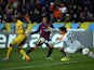 Barcelona's Uruguayan forward Luis Suarez scores past Apoel's Spanish goalkeeper Urko Pardo (R) during their UEFA Champions League football match at the Neo GSP Stadium in the Cypriot capital, Nicosia, on November 25, 2014