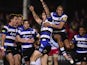 Bath player Matt Banahan celebrates with team mates after scoring the first try during the Aviva Premiership match between Bath Rugby and Harlequins at Recreation Ground on November 28, 2014