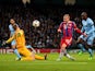 Sebastian Rode of Bayern Muenchen has his shot on goal saved by Joe Hart of Manchester City during the UEFA Champions League Group E match between Manchester City and FC Bayern Muenchen at the Etihad Stadium on November 25, 2014